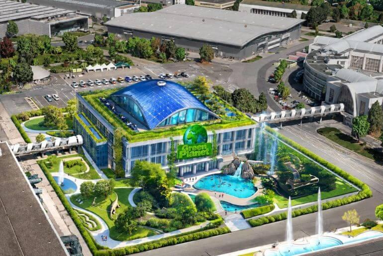 Venkovní vizualizace chystaného projektu Green Planet na brněnském výstavišti. Moderní pavilon se zelenou střechou a kupolí ukrývá budoucí obří akvárium. KULTINO*
