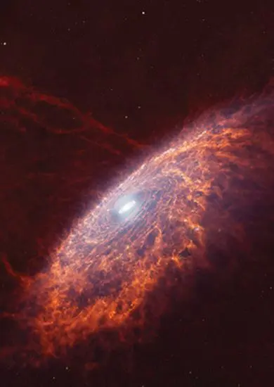 Spirální galaxie s oranžovými vlákny prachu v infračerveném světle. Pořad Putování Mléčnou dráhou v digitáriu Hvězdárny Brno. KULTINO*